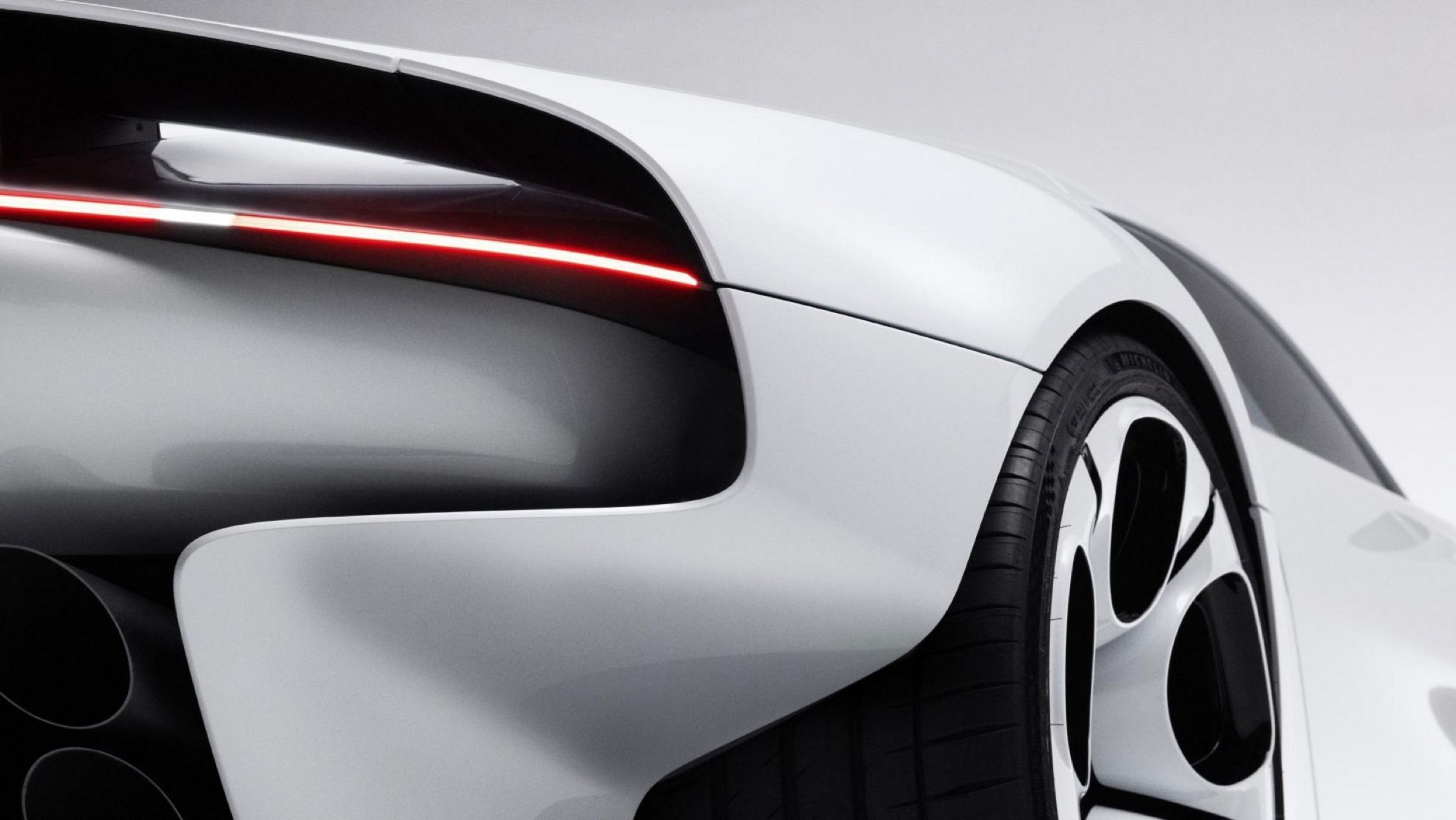 Detail of the rear haunch where the red light line wraps around the body